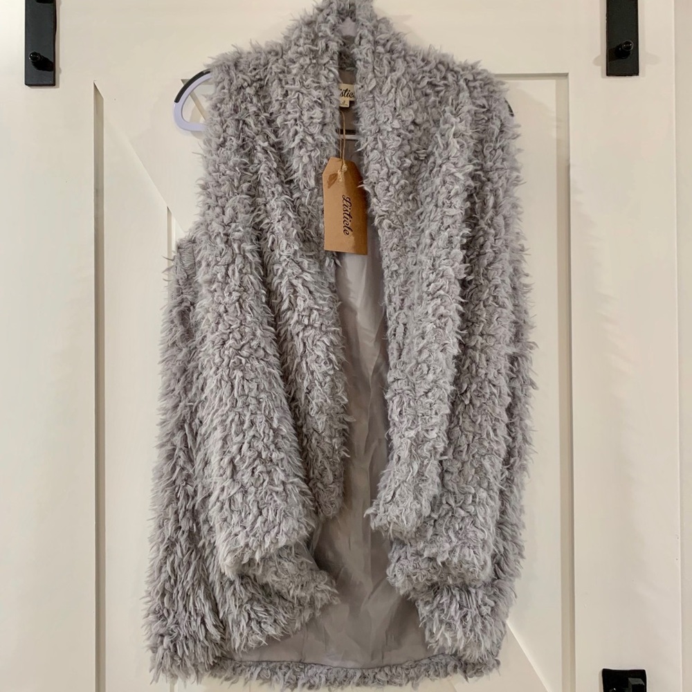 Listicle hi low pile vest